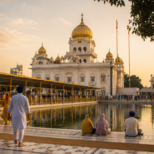 Bangla Sahib golden domes reflecting in pool